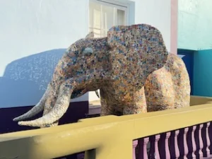 Sparkly elephant on a front porch